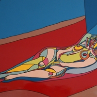 Nuda sul divano rosso